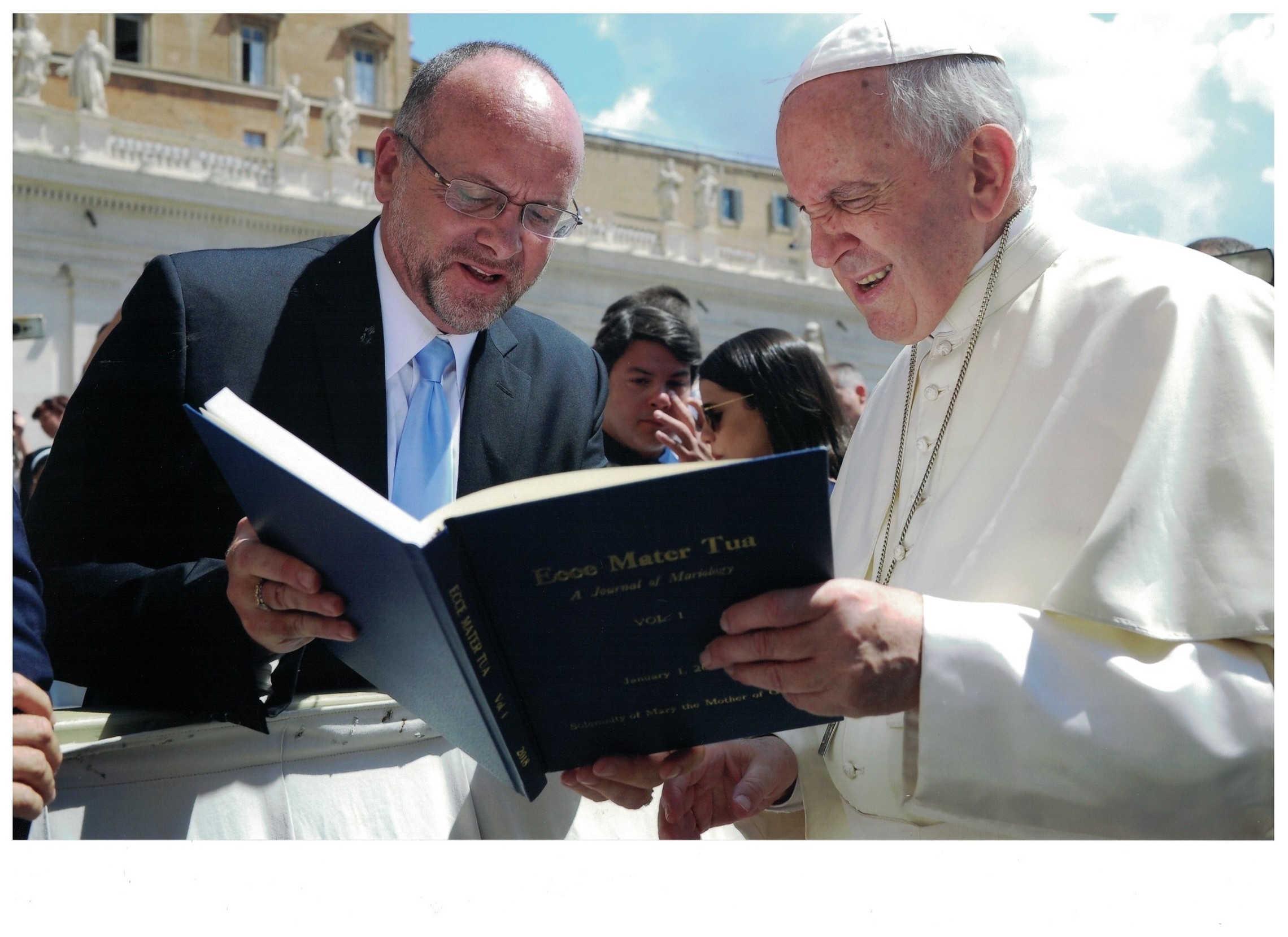 Dr. Mark Miravalle, President of the IMA, presenting hard bound volume of Ecce Mater Tua to Pope Francis